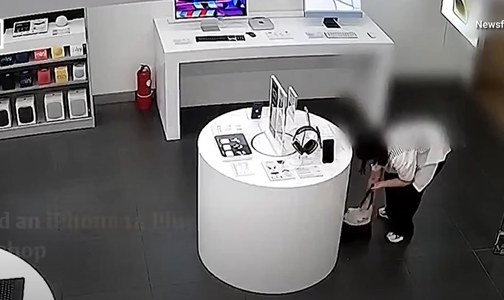 Жінка в Китаї перегризла дріт, щоб поцупити iPhone 14: відео