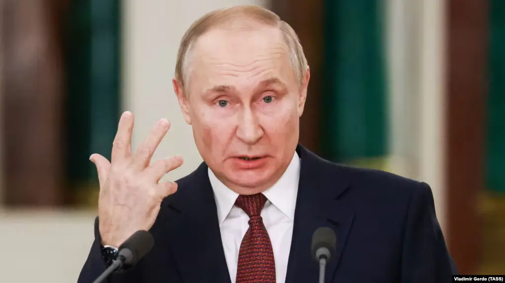 Путін